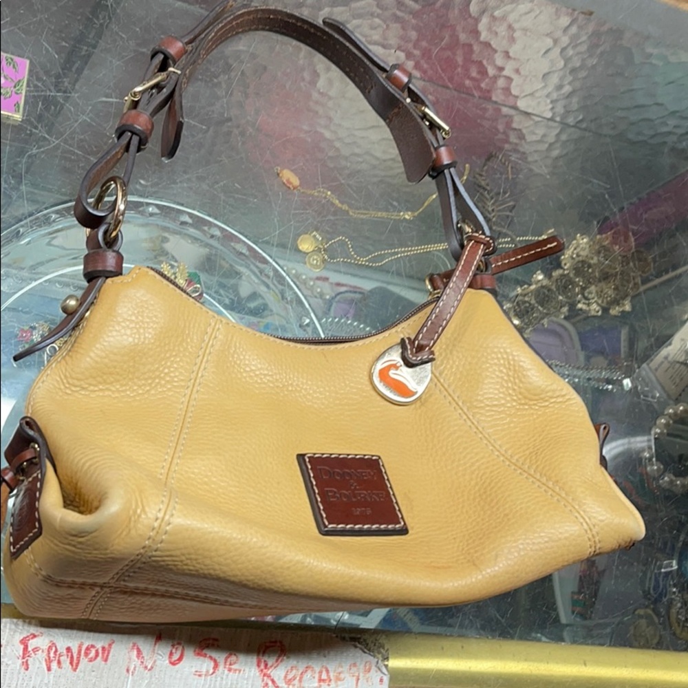 Small tan dooney & bourke handbag